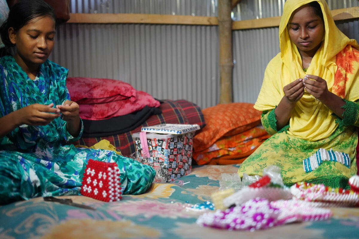 Akhi and her mother sell what they make at her mother's shop.