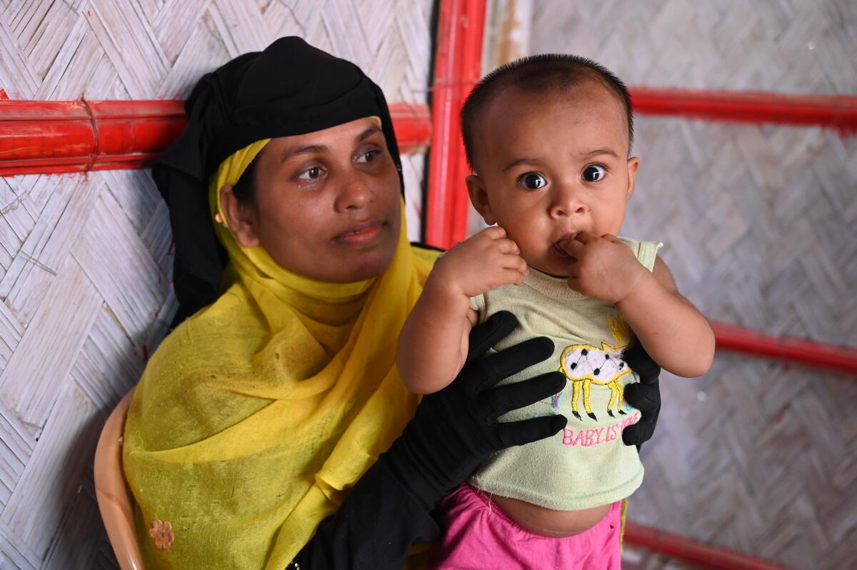 Refugee mother with child