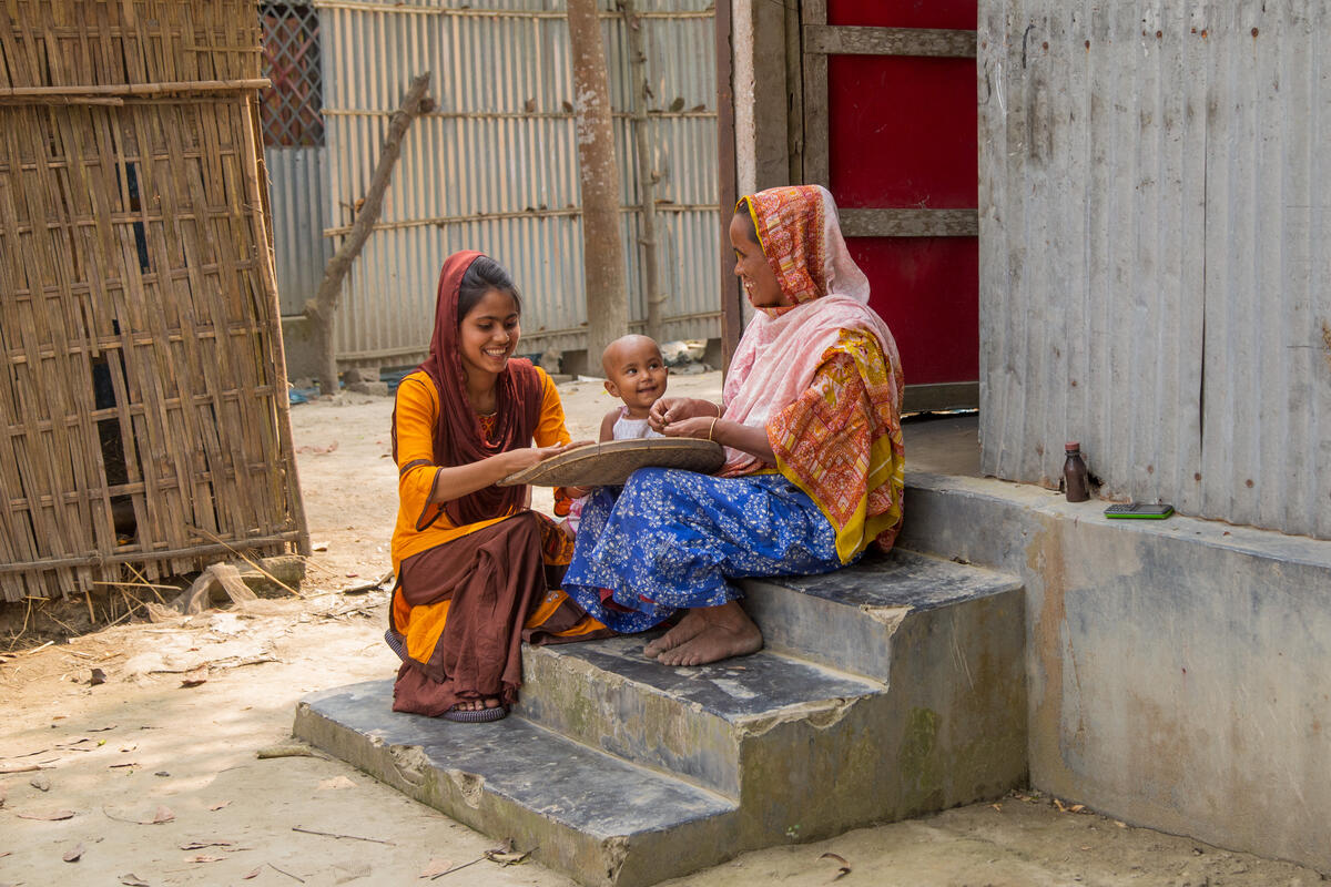 Hira and her family in Bangladesh.