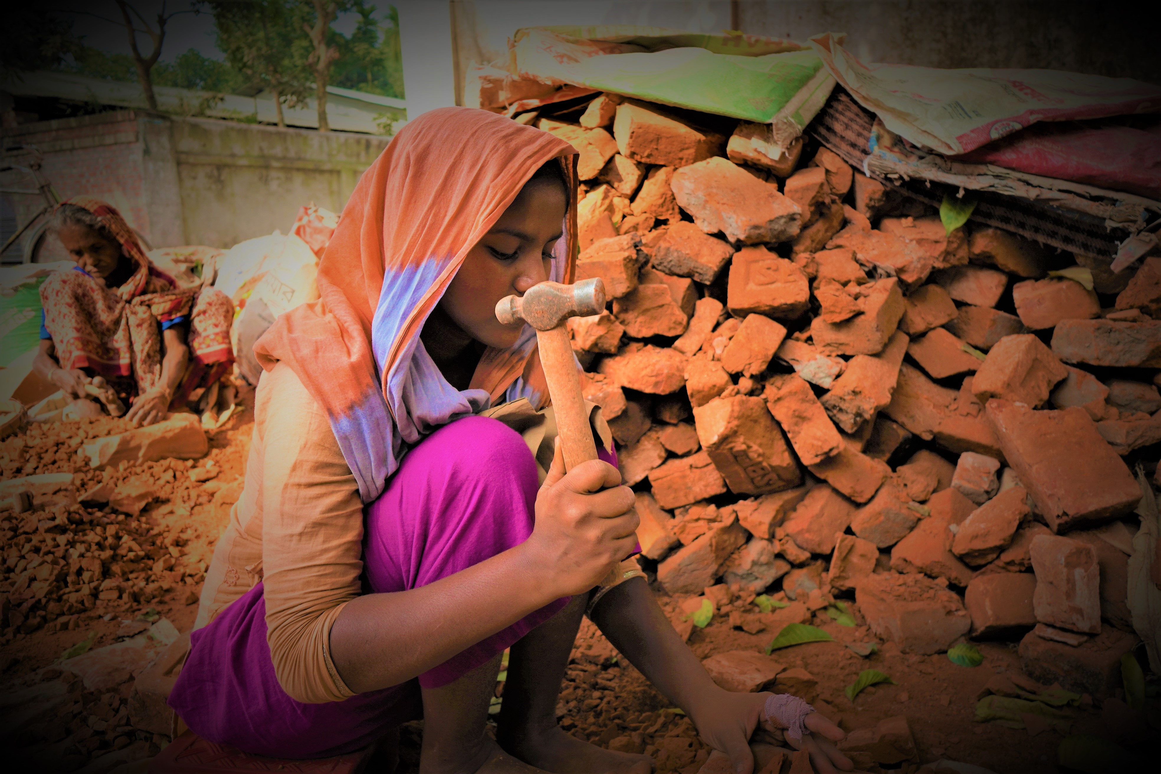 A girl working on bricks in Bangladesh