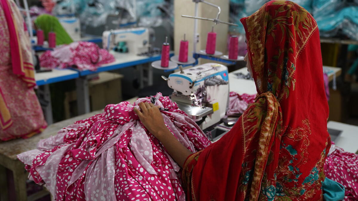 Girl forced to work in a textiles factory