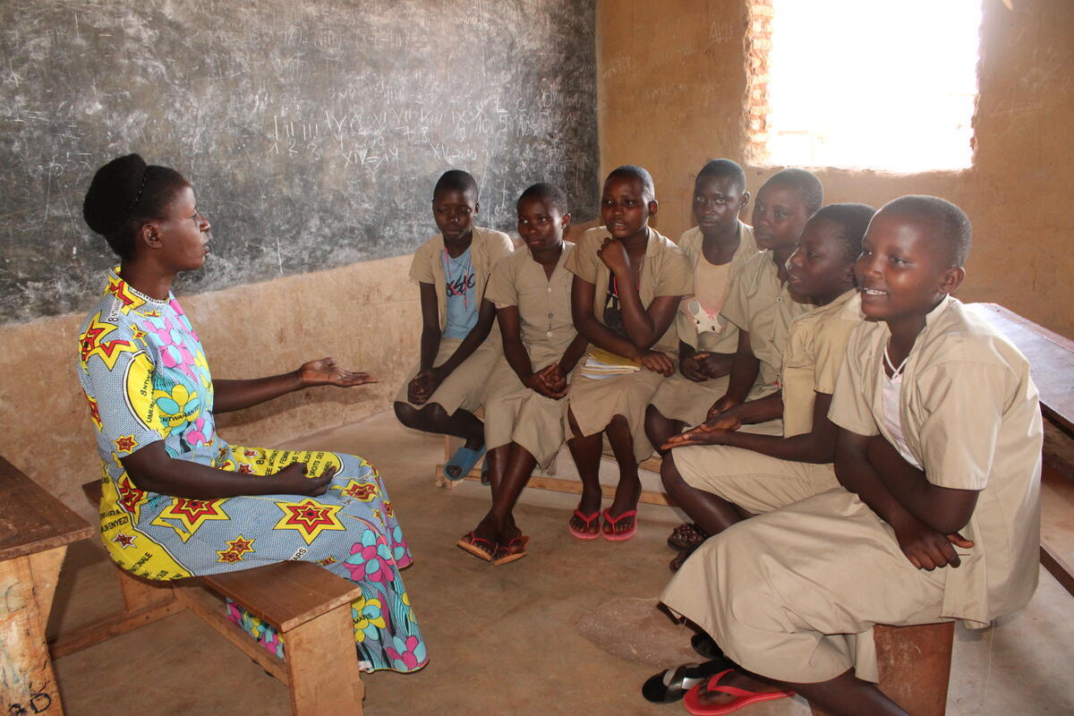 Josephine, is a school Auntie. She is glad to share timely support to young school girls whenever they turn to her.