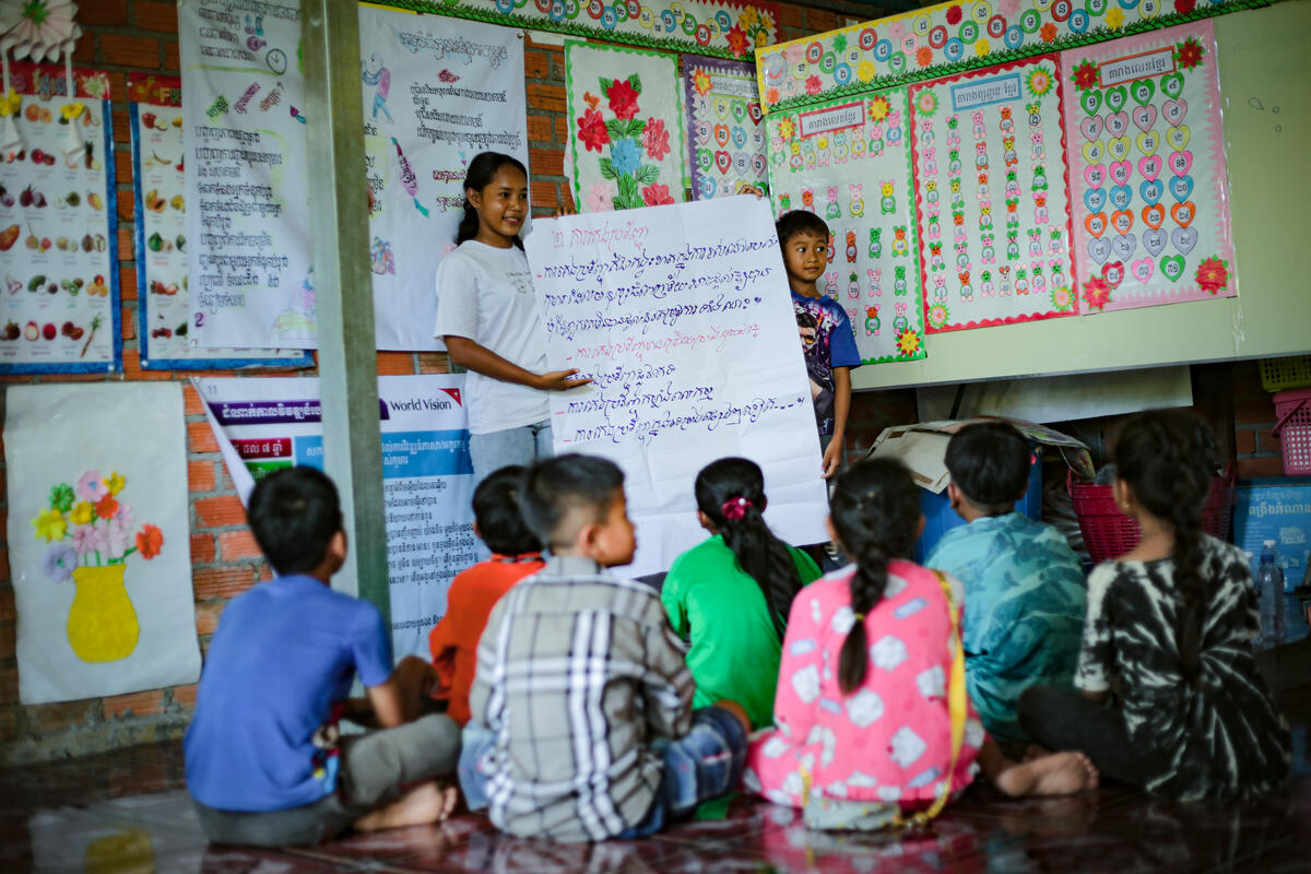 Child members being led by Sinan, the child leader i a child adolescent youth training session.