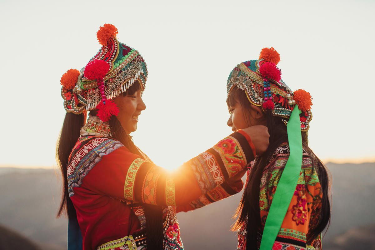 Mother in China adds traditional dress for her daughter