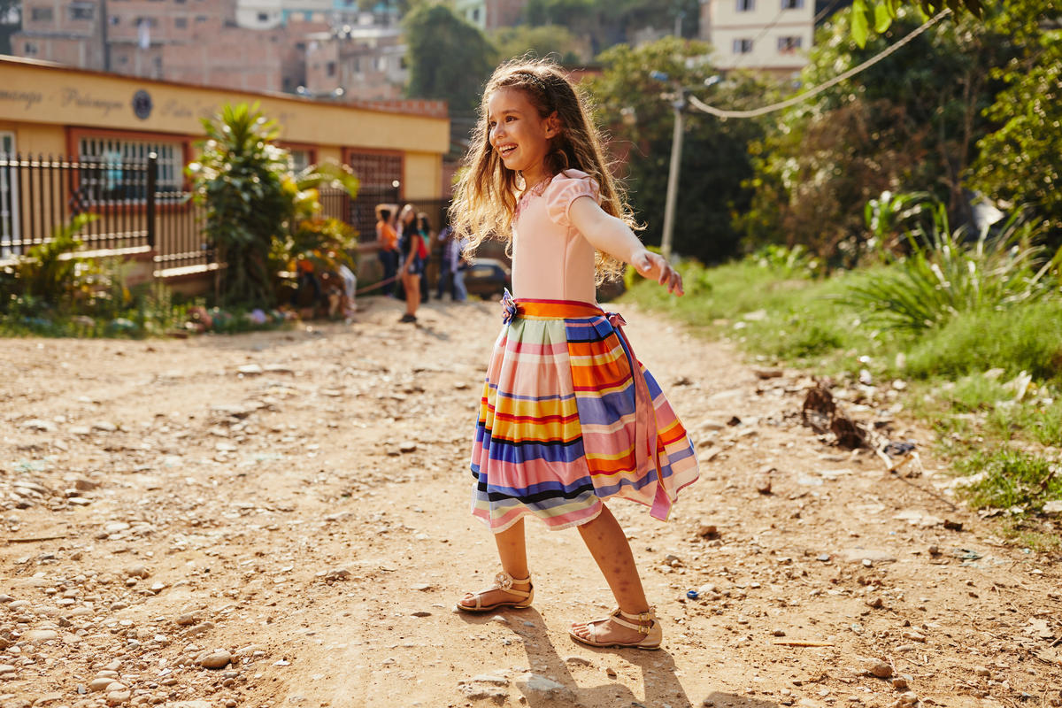 A girl dancing happily