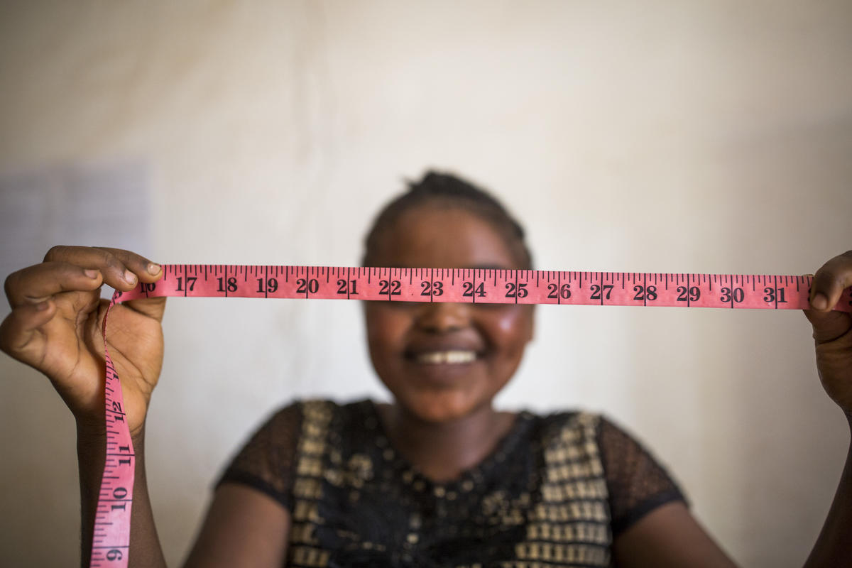 Lea, 18, poses for a portrait at the rebound centre  in DRC.