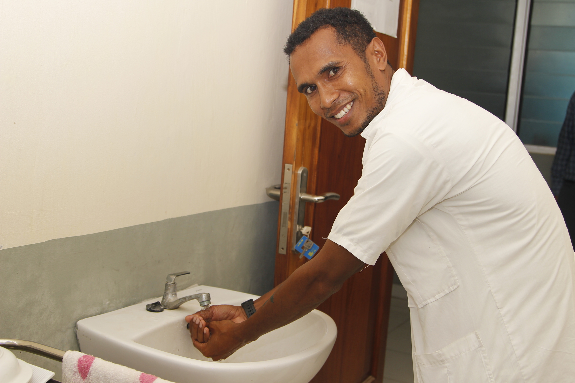 Emilio, a doctor at a local health centre, said that the clean water connection has helped him to carry out his duties to serve his community. Photo: Jaime dos Reis/World Vision