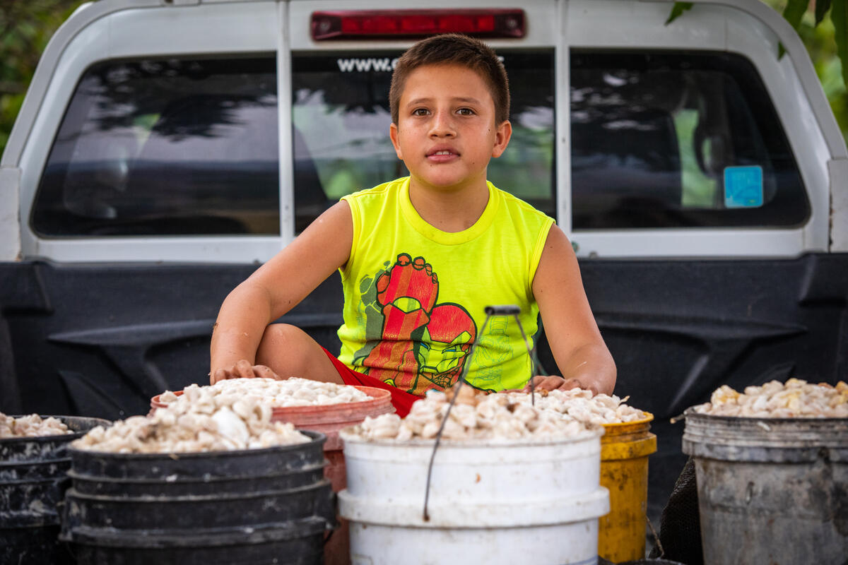 Joshua's family works hard together to try to make up for the loss of his father duing the pandemic.