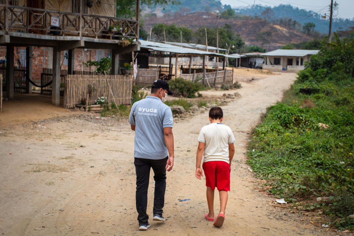 World Vision staff visit Joshua to help him overcome the grief of losing his father.
