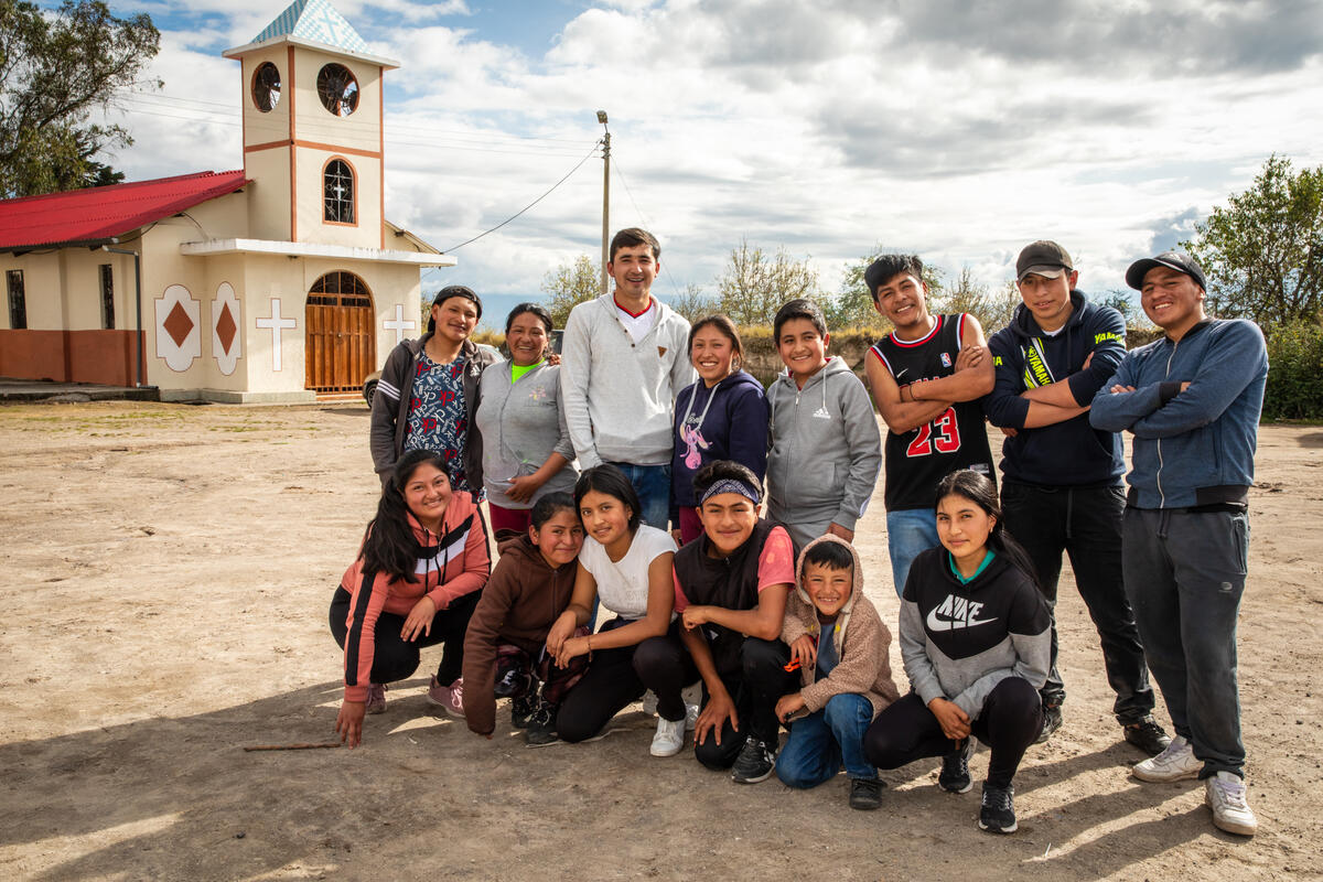 Daniel, far left, poses with the community dance group he helps lead.