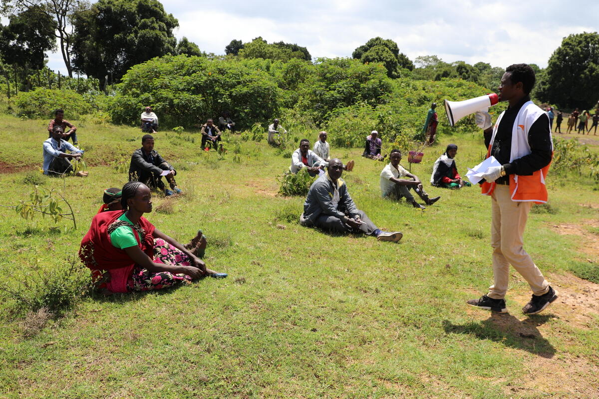 World Vision staff distribute food in socially distanced manner in Ethiopia