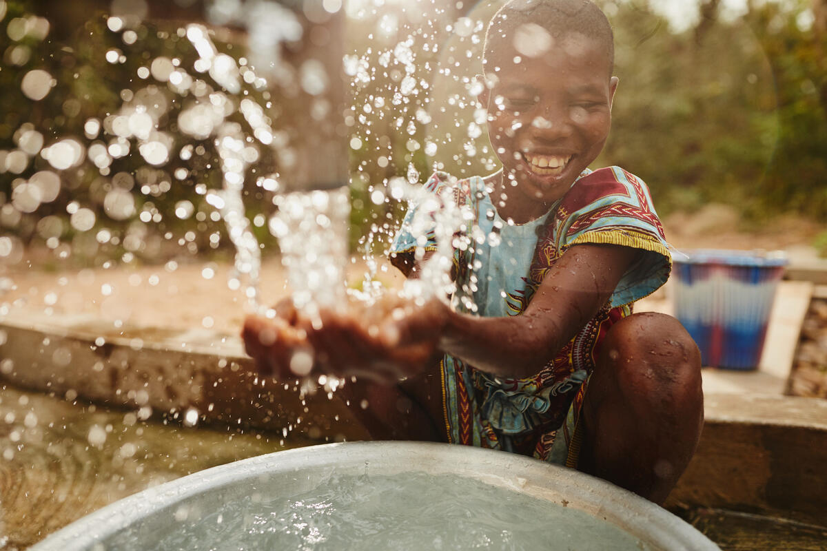 A child playing with water 