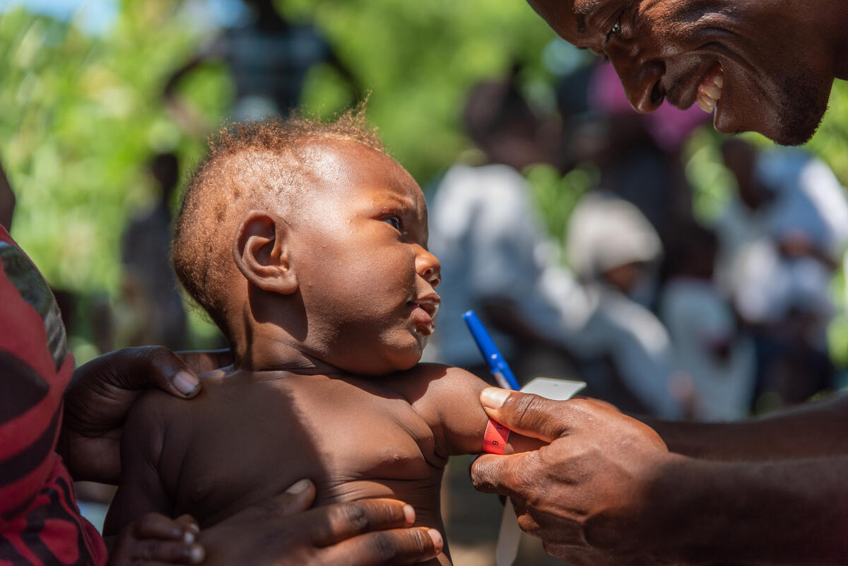 A child receiving his vaccine shot