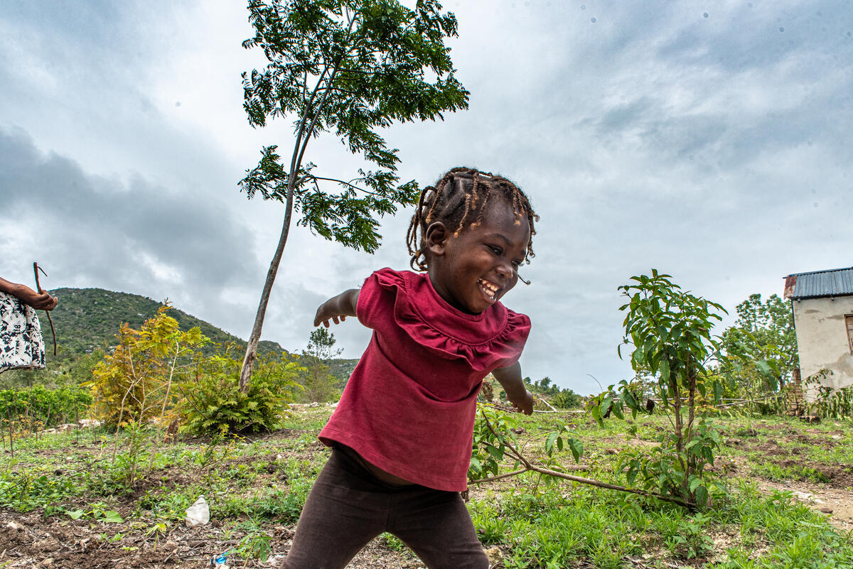 Thanks to the food voucher programme she is growing up health and strong.