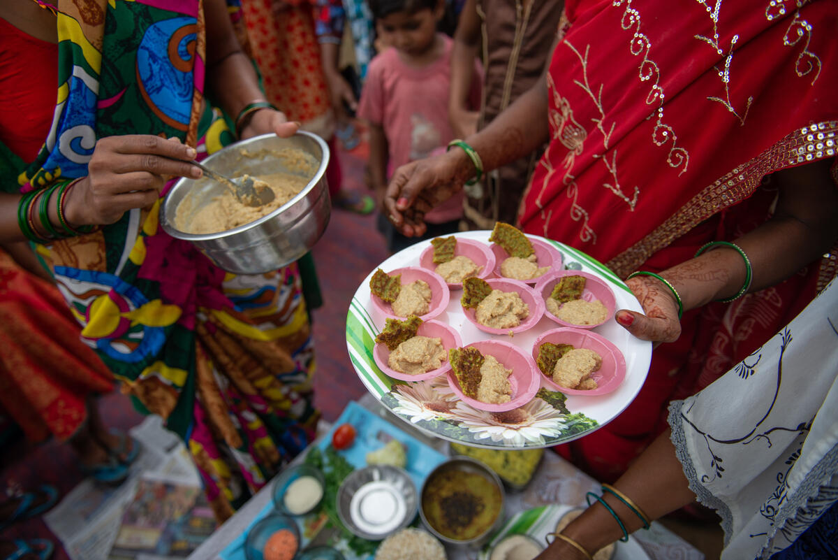 Food prepared at the cooking demonstration is shared around.