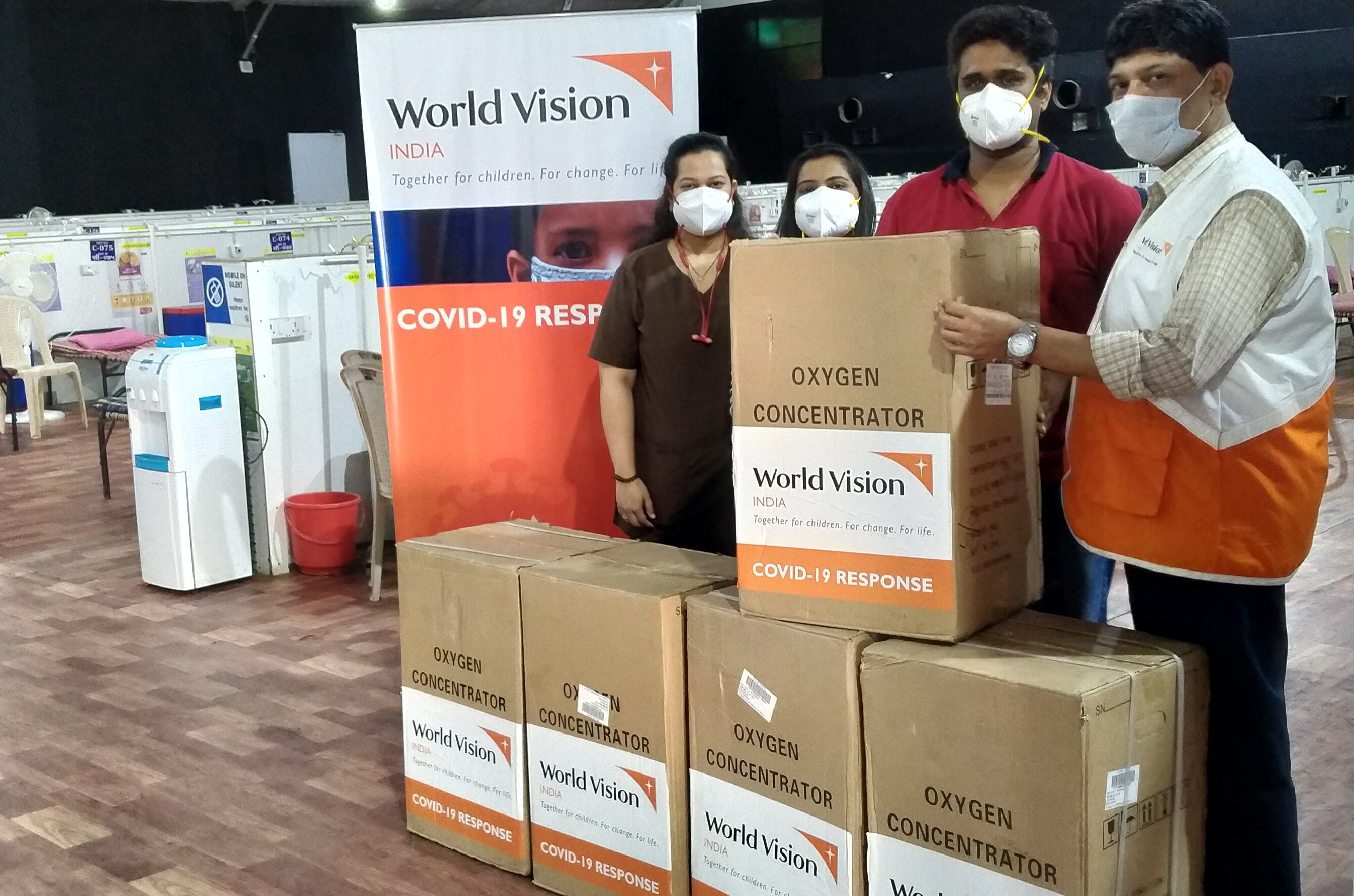 World Vision staff with COVID-19 equipment
