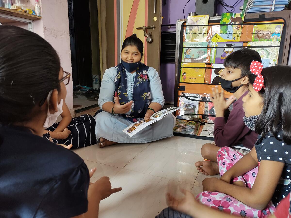 Rajeshree teaches children at the workshop.