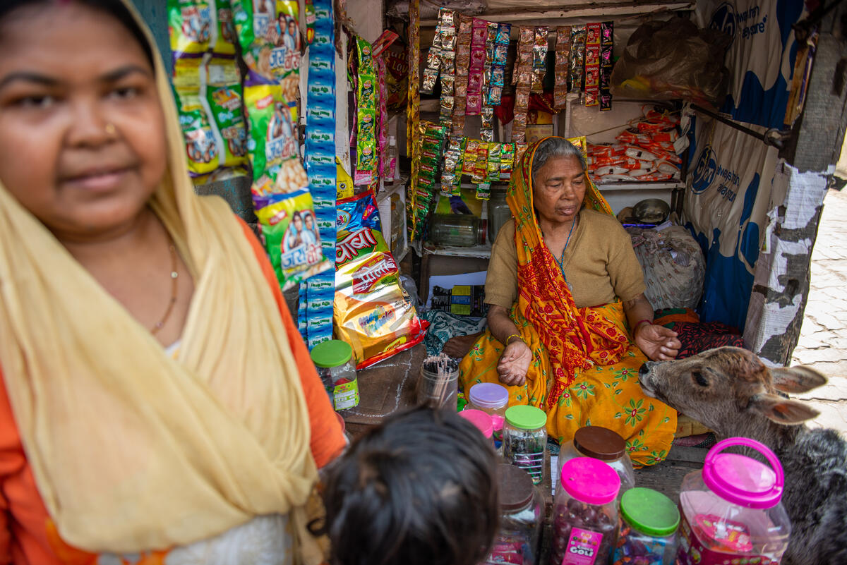 Santosh and her mother at their family shop in India.