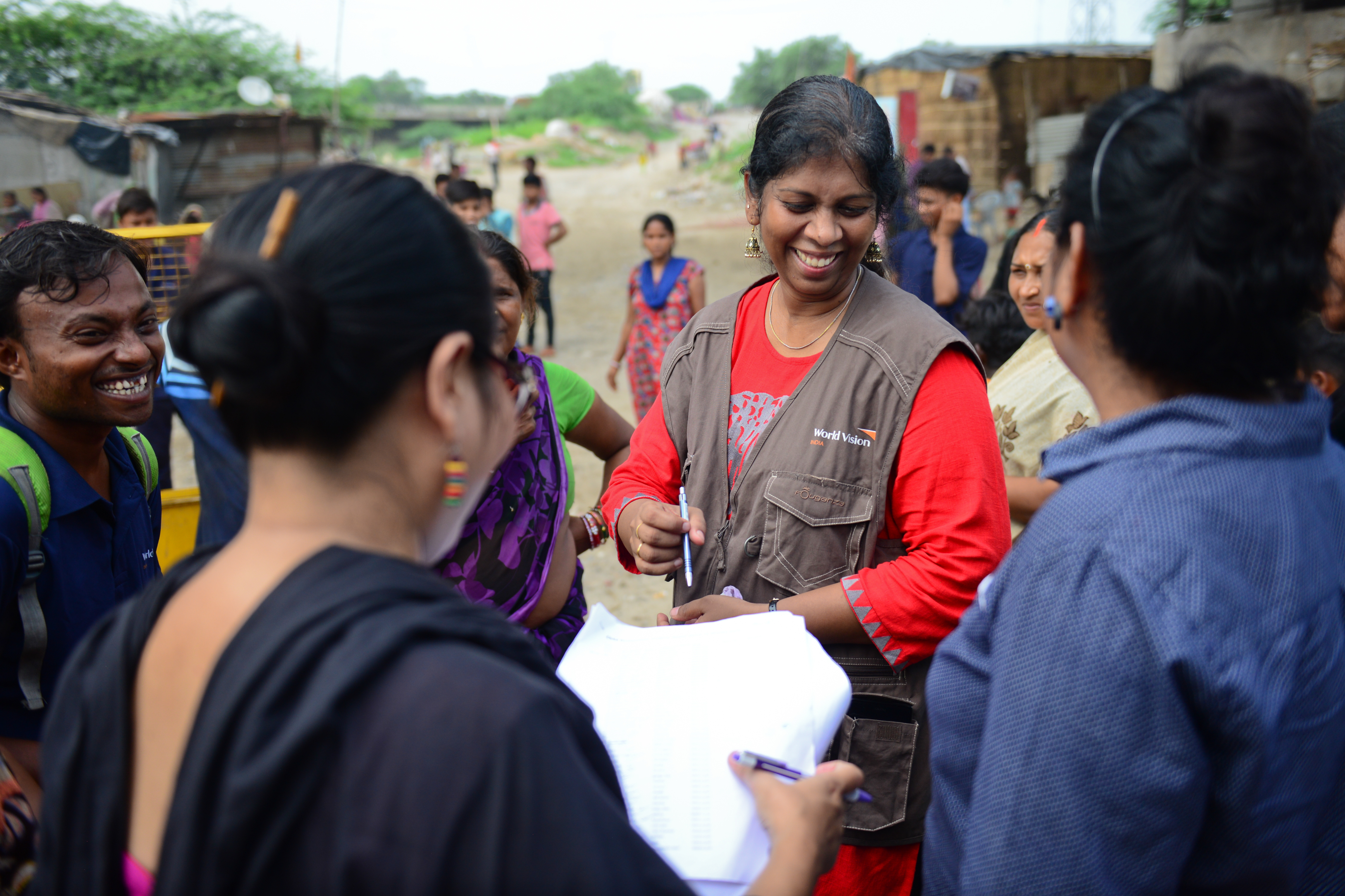 Mercy passionately interacting with locals in Delhi.