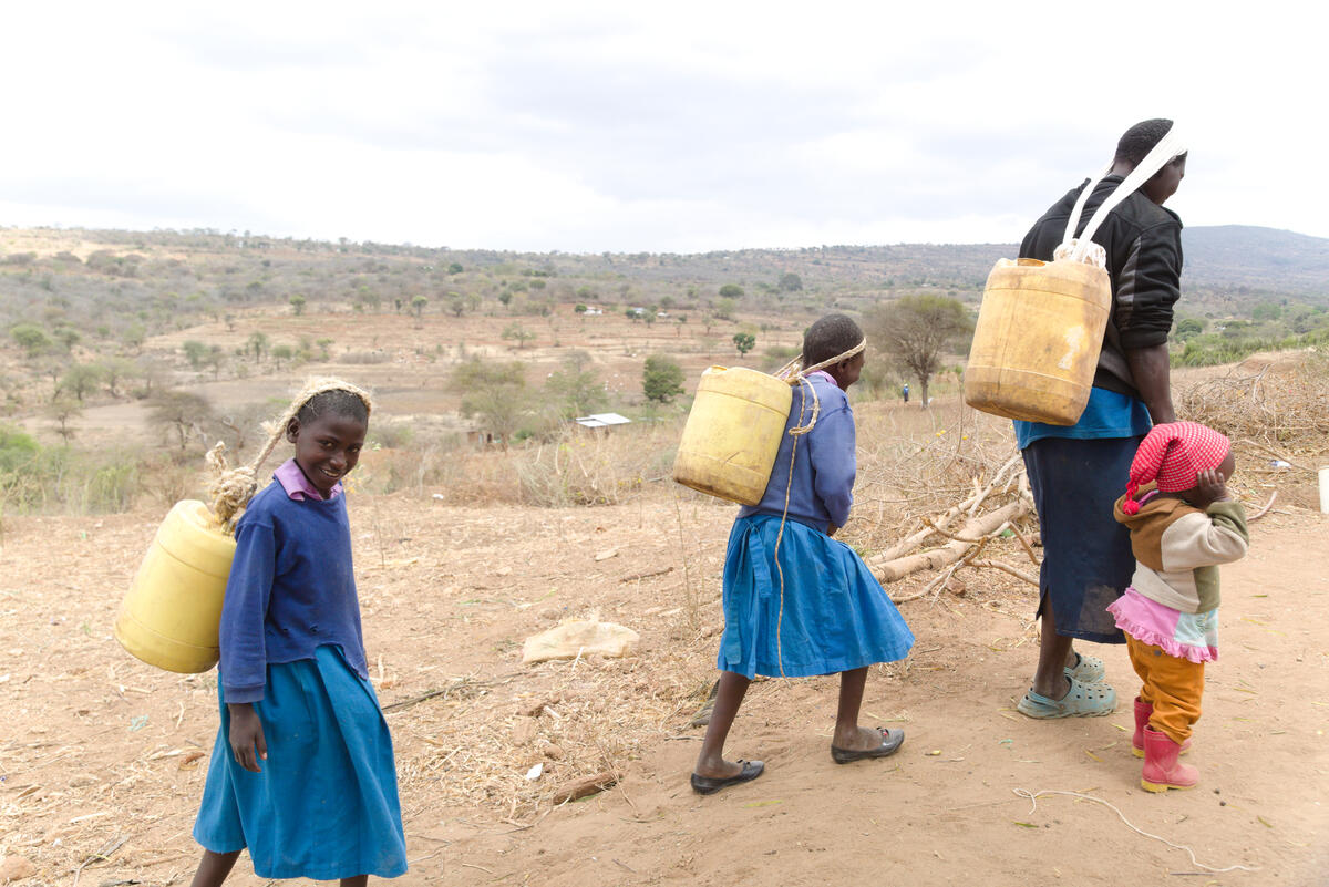 The distance Anastacia and her daughters have to travel to collect water has increased since severe drought overtook their village of Muukuni.