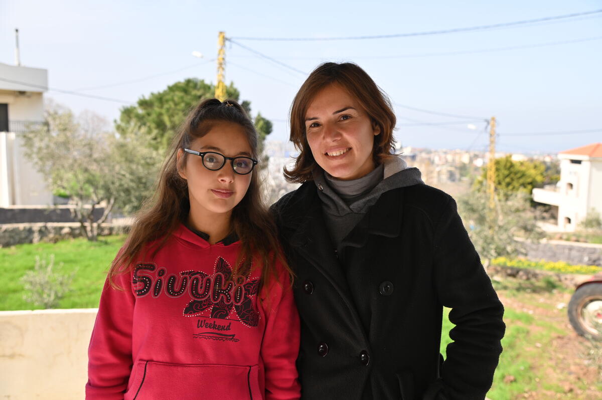 Safaa, mother from Lebanon, with her young daughter.