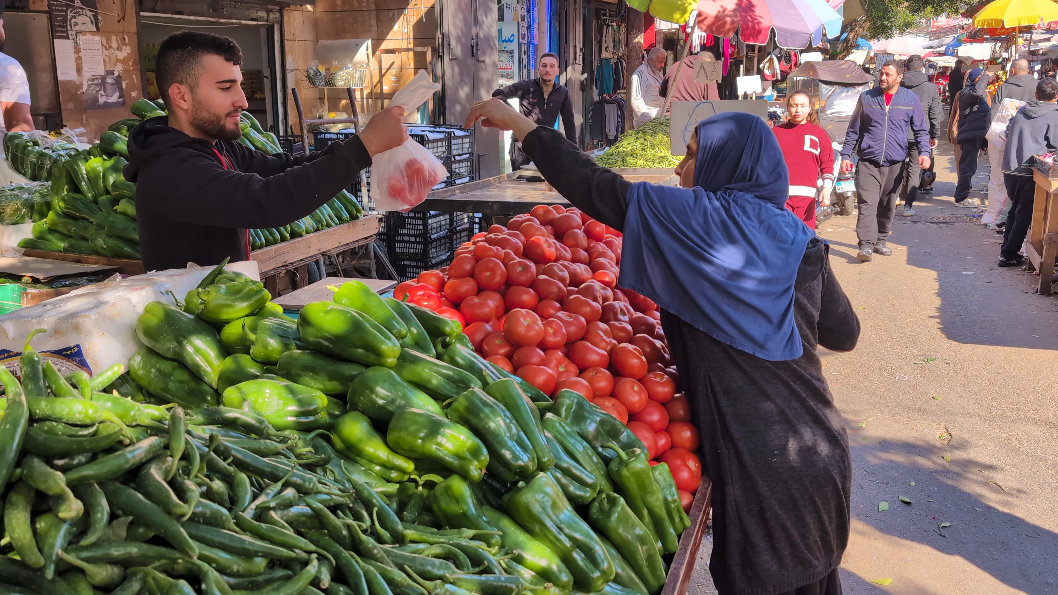 Samia Buying vegetables from the souk