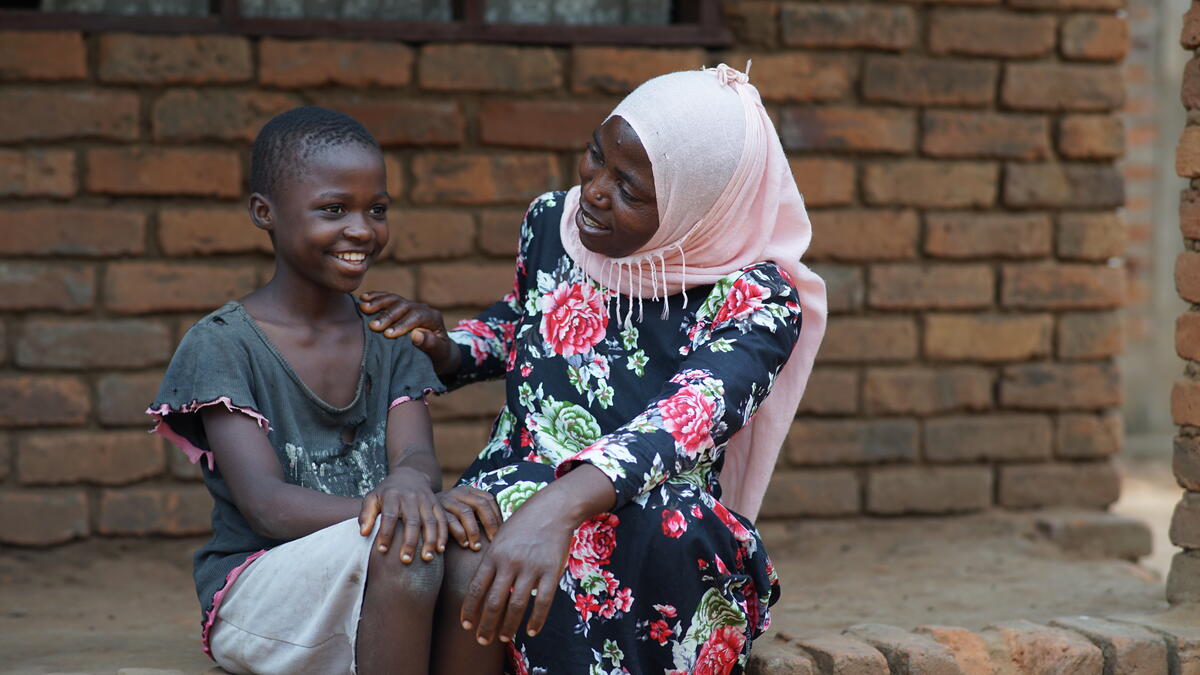 Loyce is proud of her daughter Jerodini who dreams of becoming a nurse to treat the sick in her village