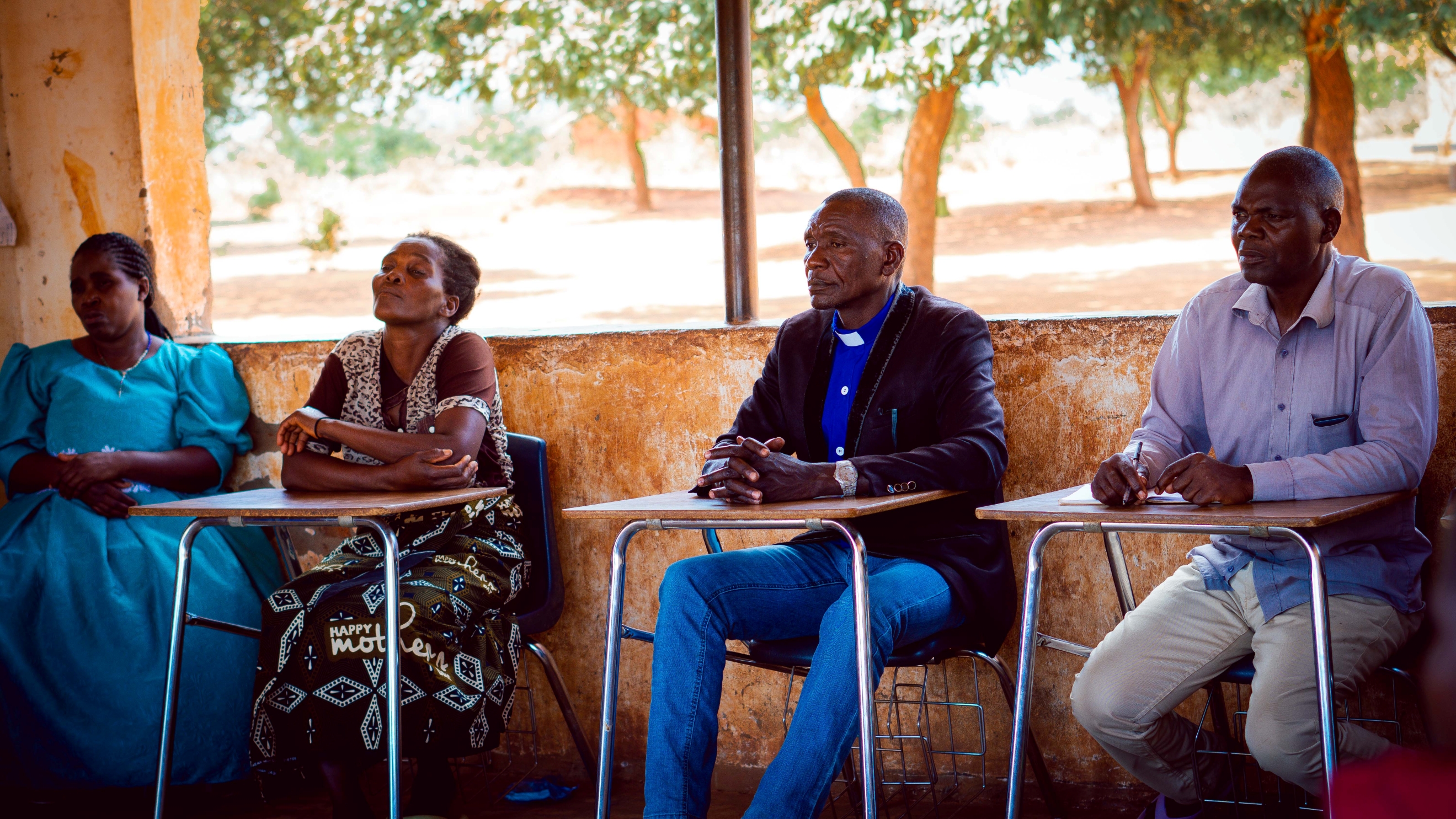 Faith leaders and community members take part in a Nutrition Dialogue session/ Malawi / 2024.