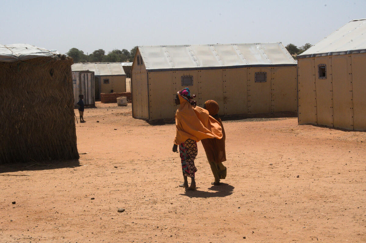 Girls walk together in Niger