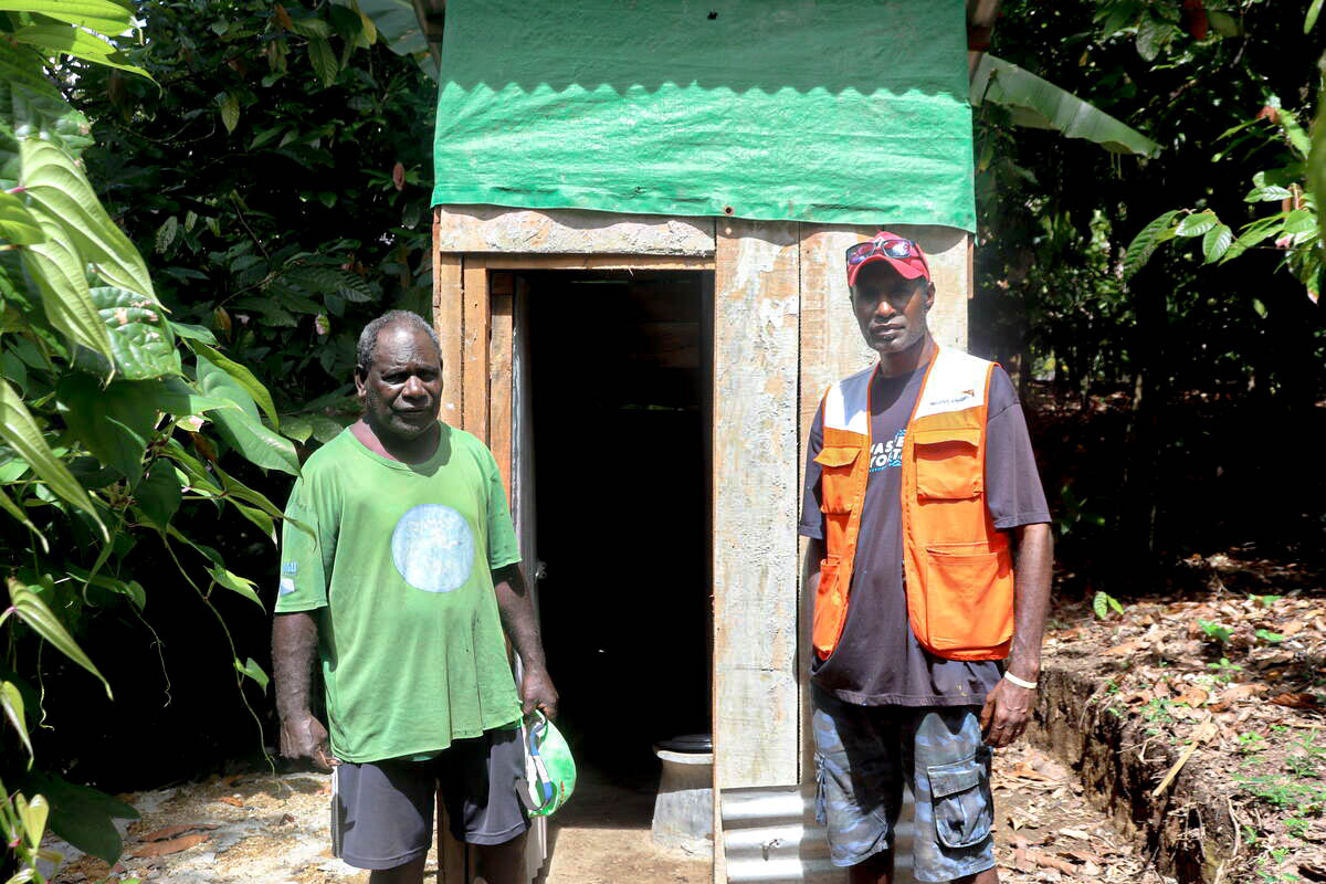 Chief Sam Hining joins forces with Adrian Travertz a dedicated World Vision Project Officers in Hanong village, South Bougainville, working together to drive community development and lasting change.