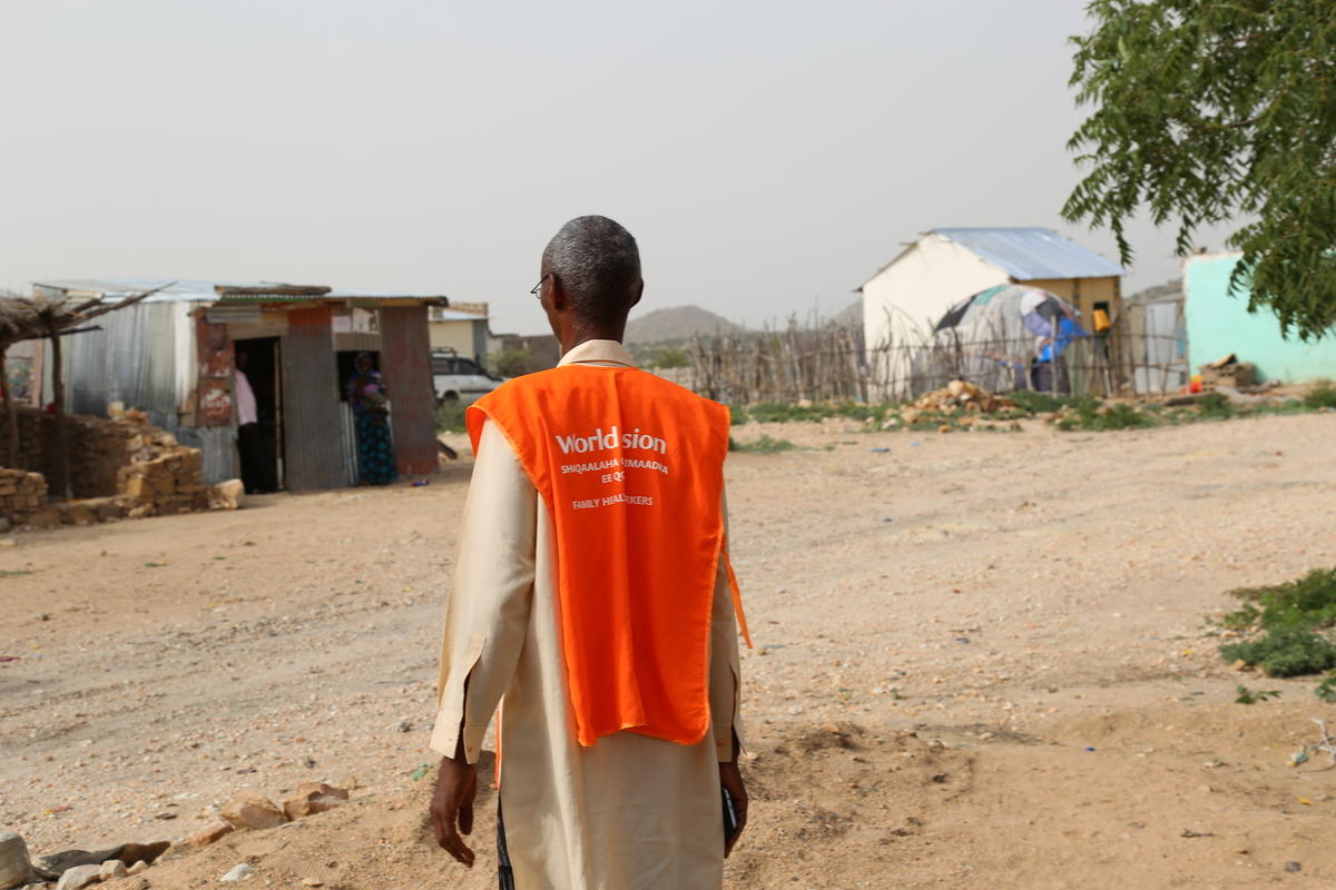 Dayib during his door to door  home visits to mothers and children living in Kalabaydh Village. (photo by Abdirahman Abdilahi Muse/July 13, 2019