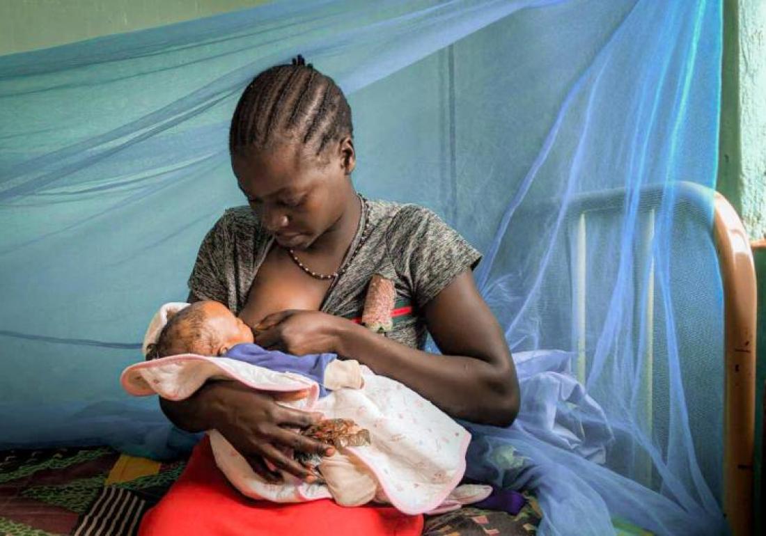 Woman breastfeeding her child