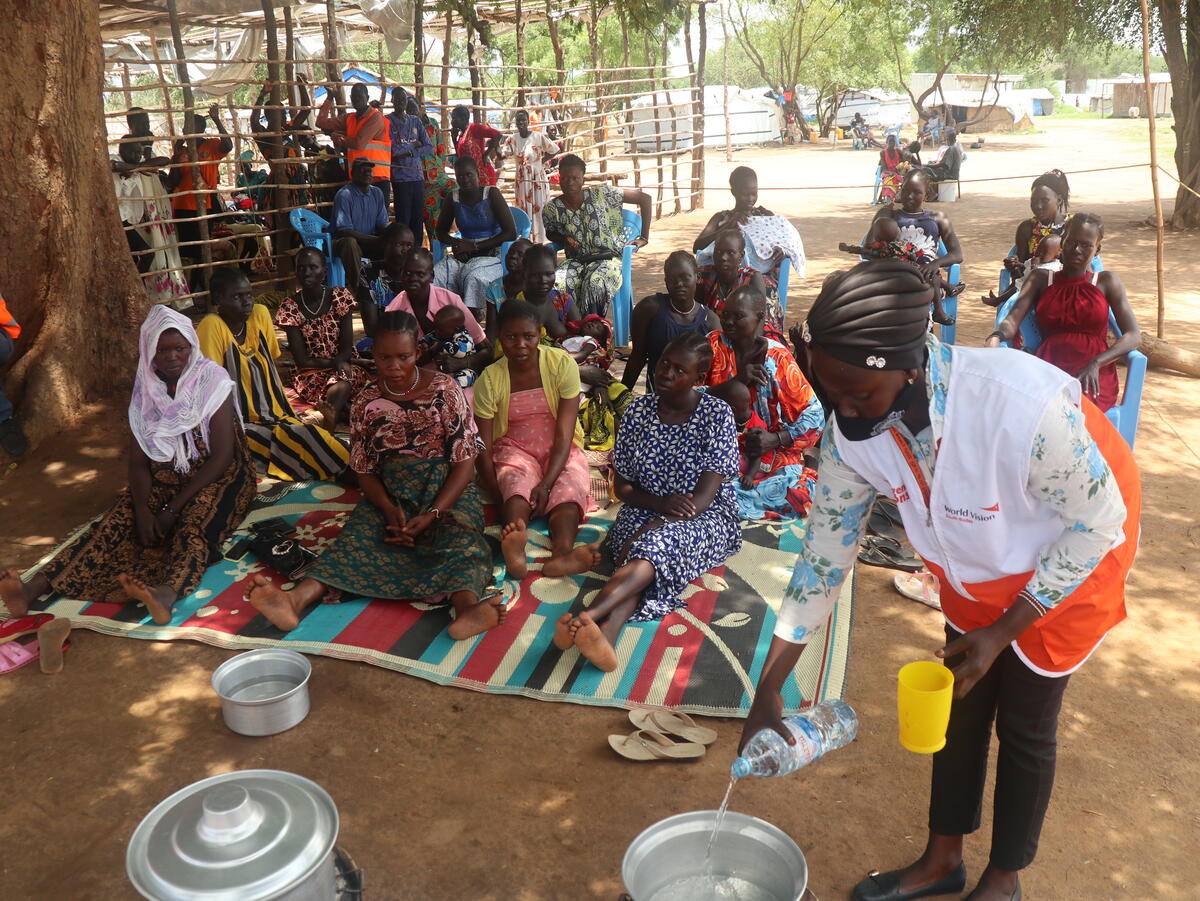 People await their VitaMeal rations.