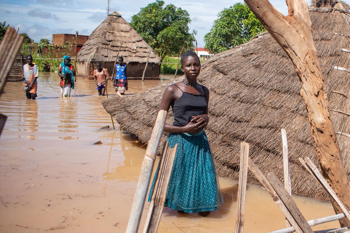 Girl stands in flooding