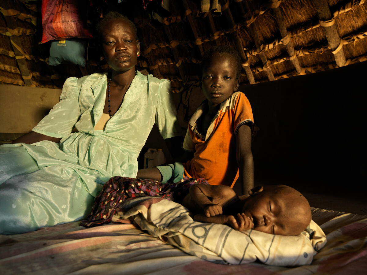 Kuel with his mother Areech and little brother