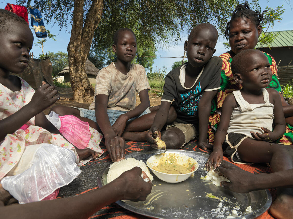 Mandela and his siblings eating