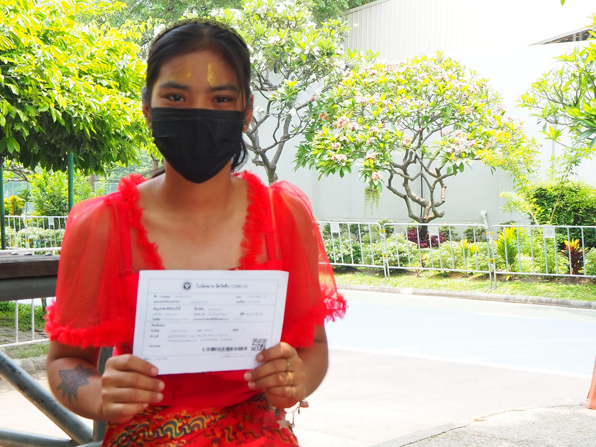 A Myanmar migrant worker who has received COVID-19 knowledge and vaccine as suggested