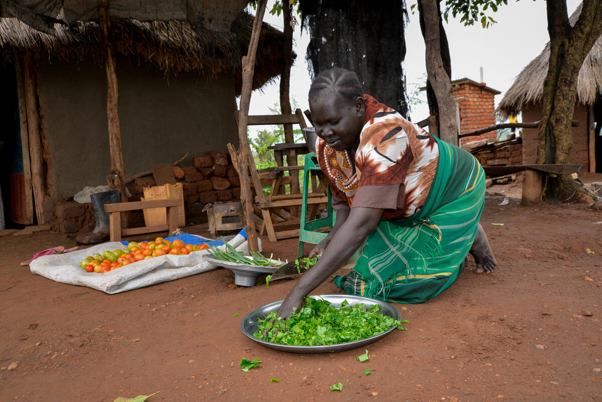 Maria prepares onions for lunch