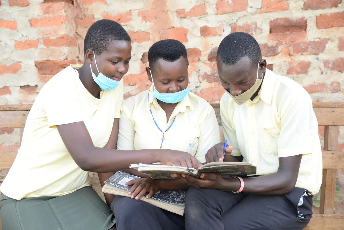 Juliet studies in school with her peers