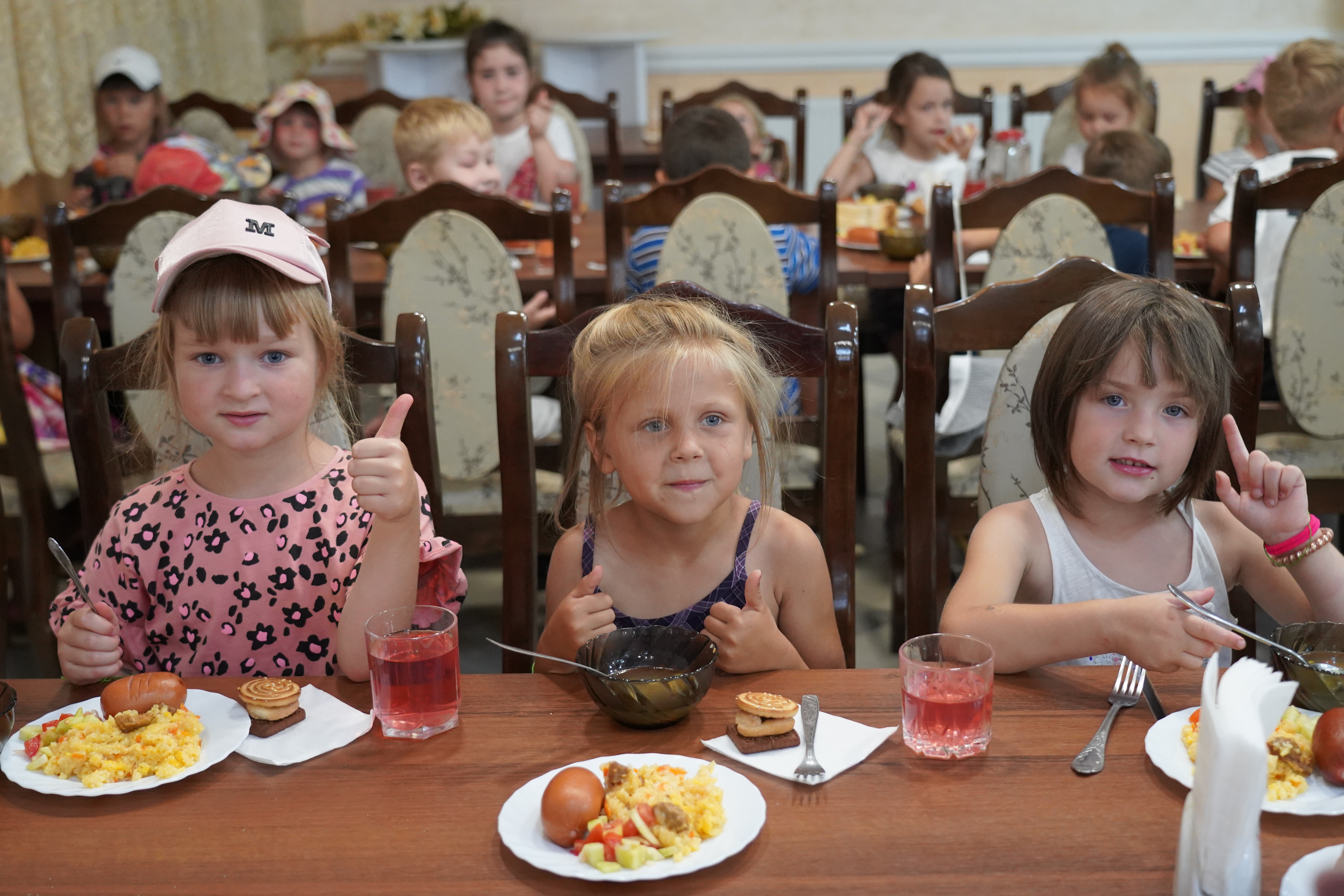Children enjoy lunch together at a Summer Camp supported by World Vision in a village in Western Ukraine 