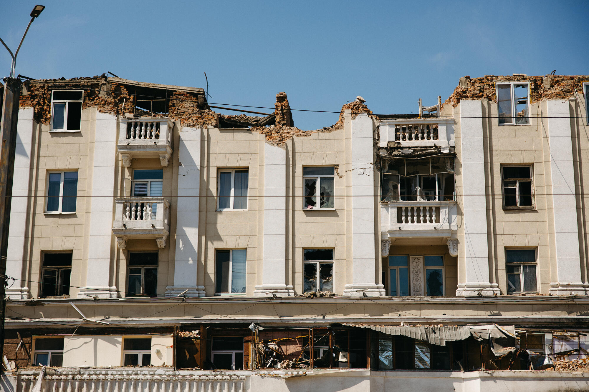 A long building destroyed by a missile