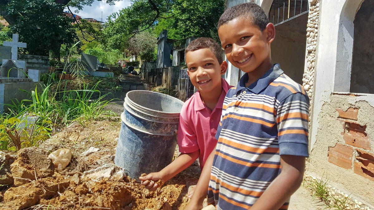 Luigi and Luis help their father worked at this cemetery in Venezuela.