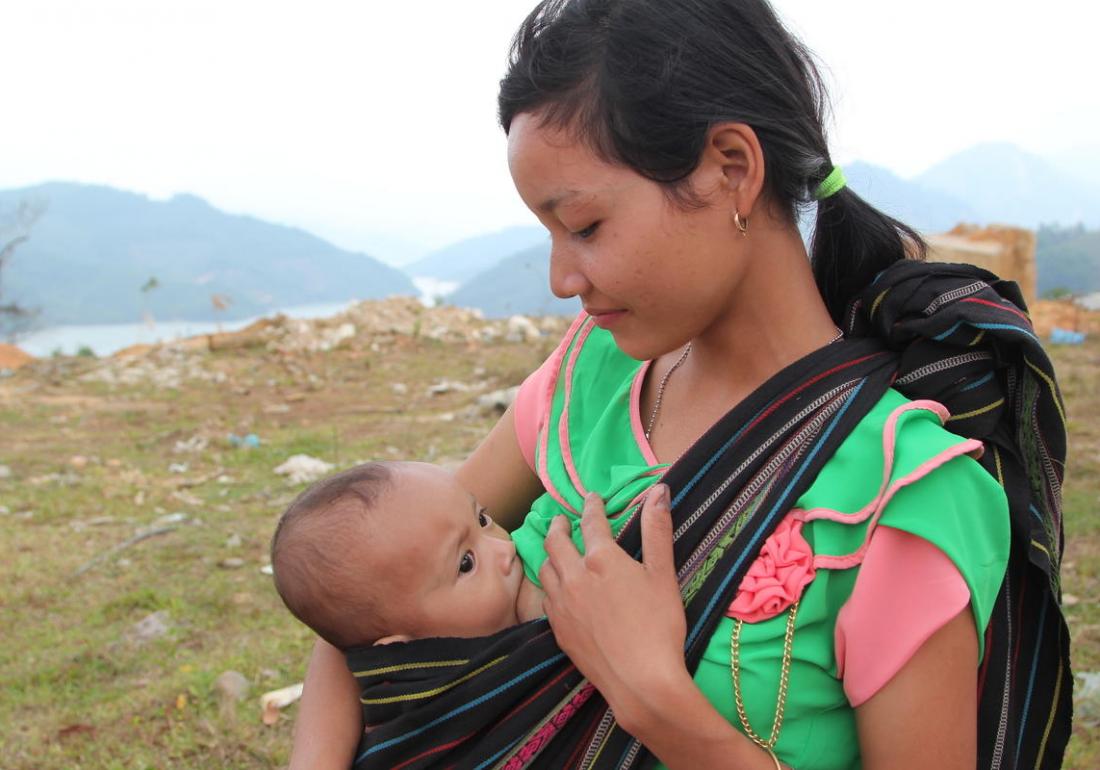 mother breastfeeding her child