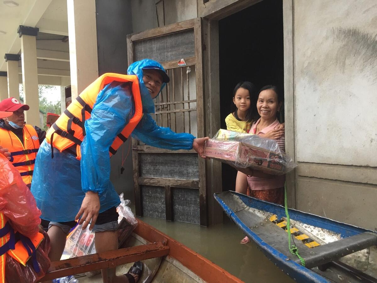 World Vision distributes emergency food and non-food items to families affected by flooding in Vietnam.