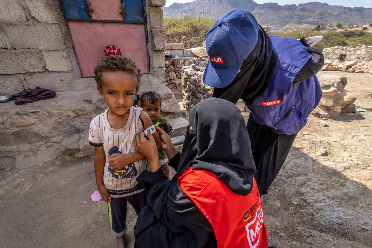 2-year-old measured for malnutrition