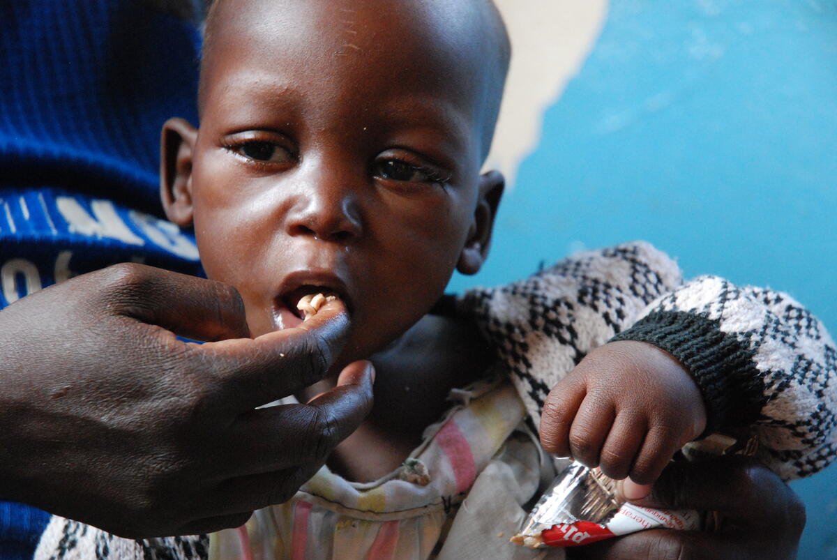 Swangirai in Zambia eats Plumpynuts at 11 months old.