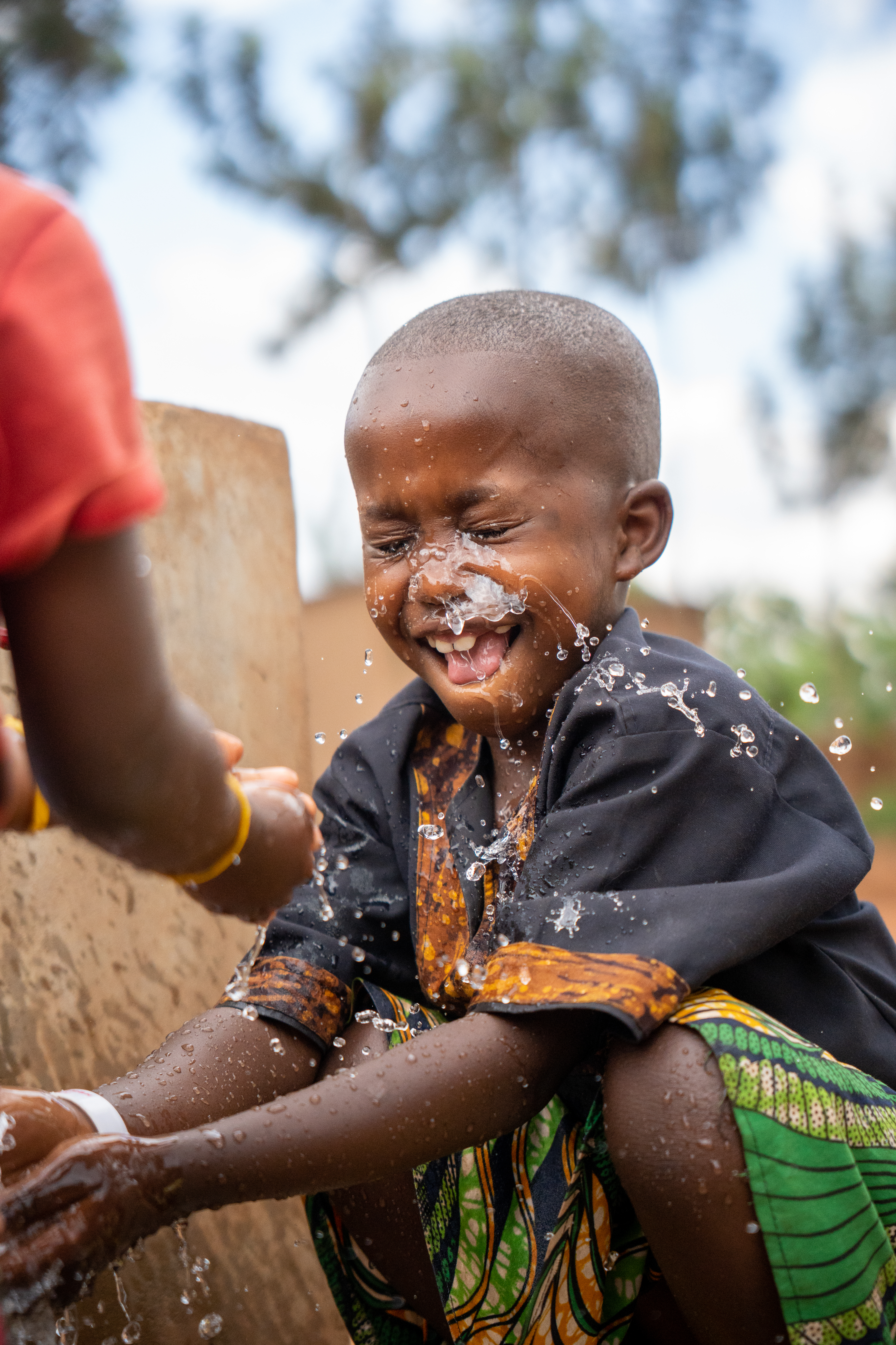 Children enjoying access to water