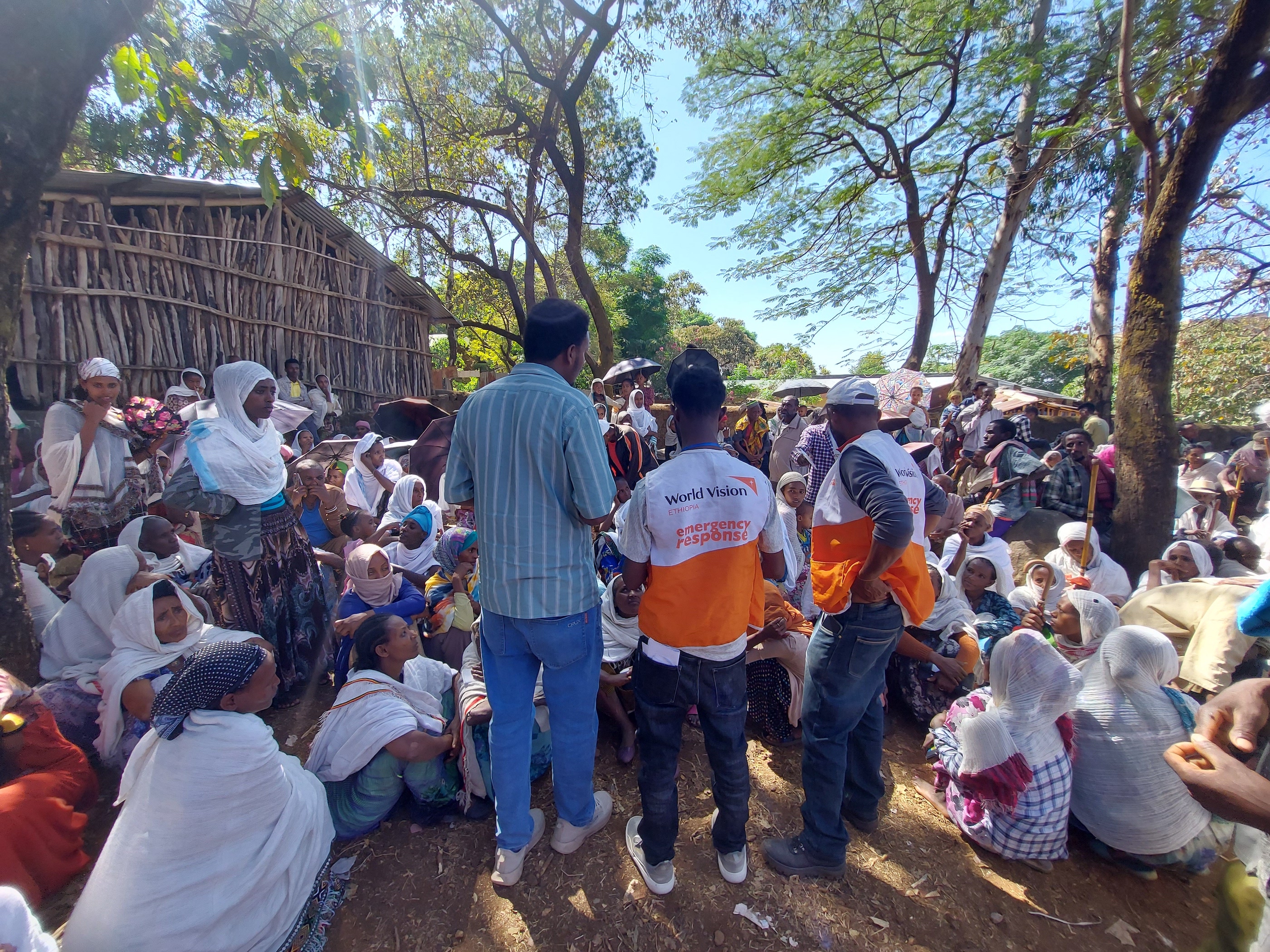 World Vision Staff and Volunteers giving training