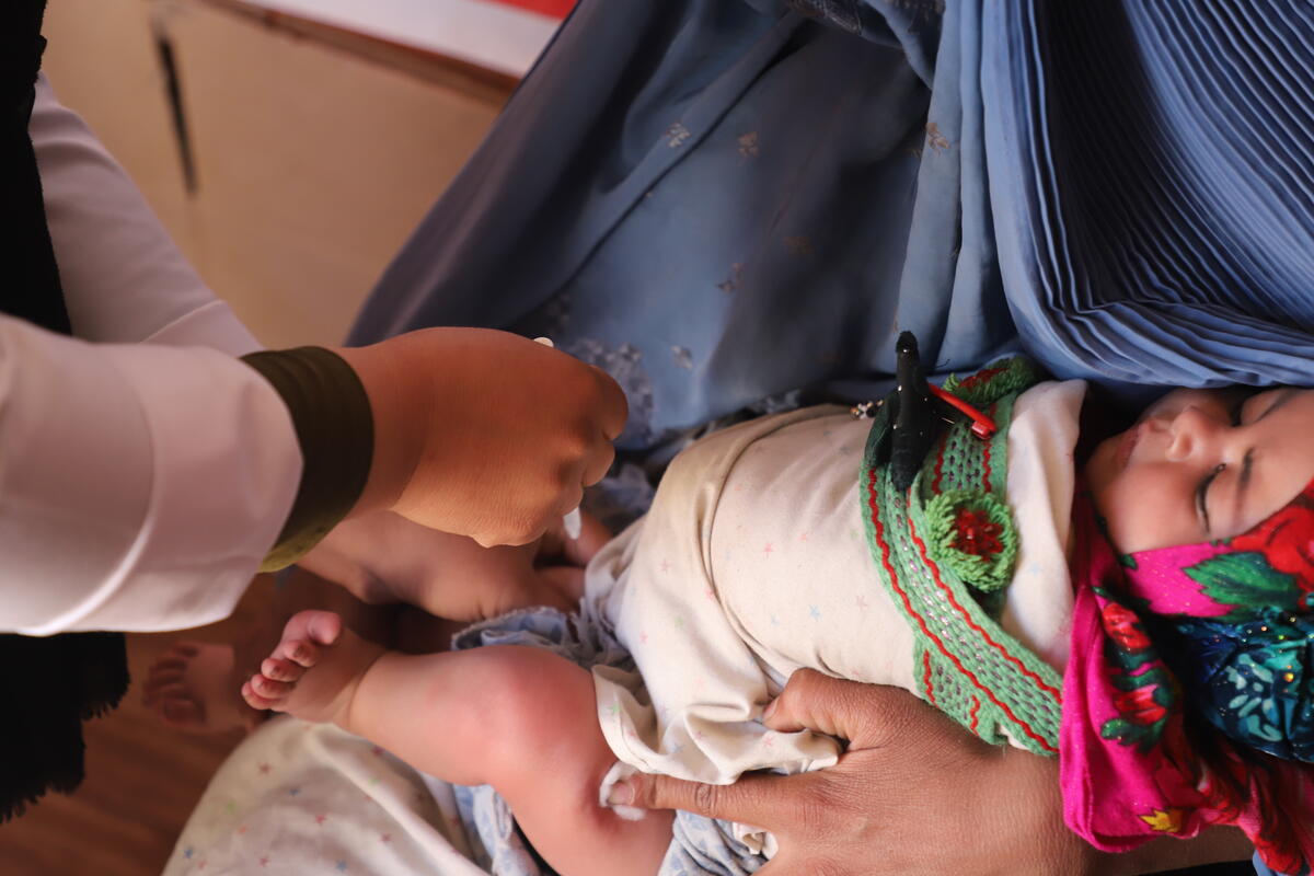 Residents of Shaydayee camp bring their malnourished children to World Vision mobile health team to receive health services.