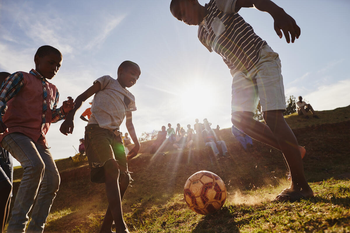 children playing soccer